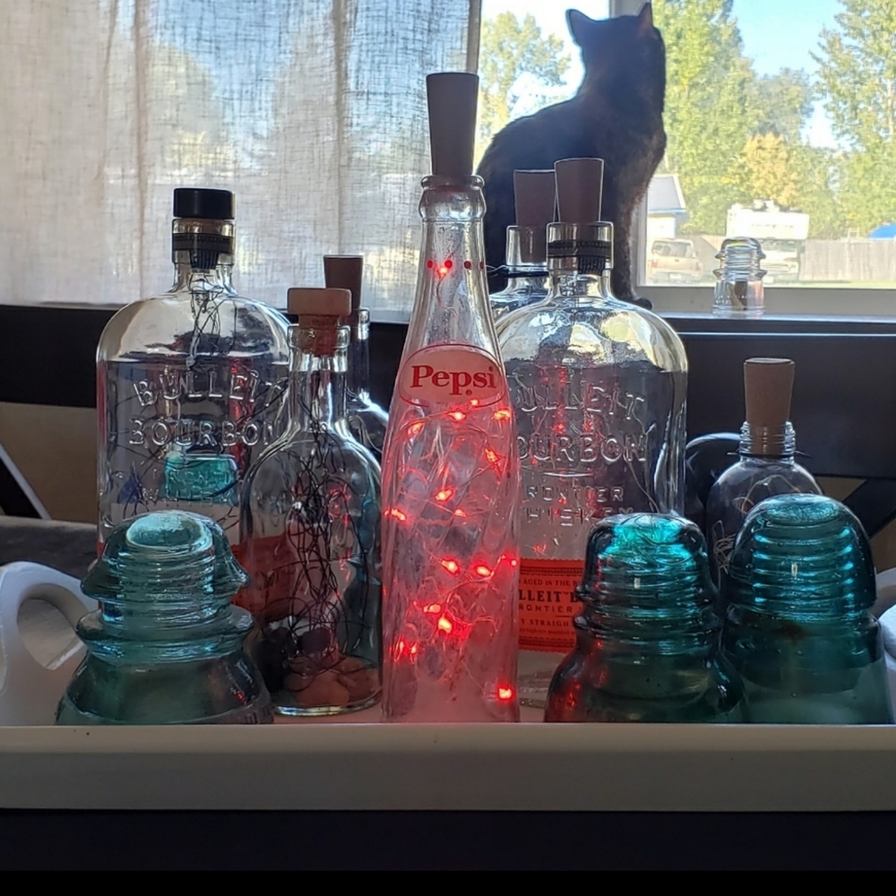 Vintage Pepsi bottle with red fitted string lights